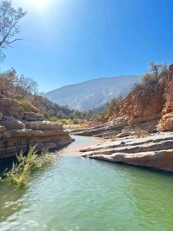 Paradise Valley, Agadir - A lush, scenic valley with clear water pools, palm trees, and rocky mountains, perfect for hiking and relaxation.